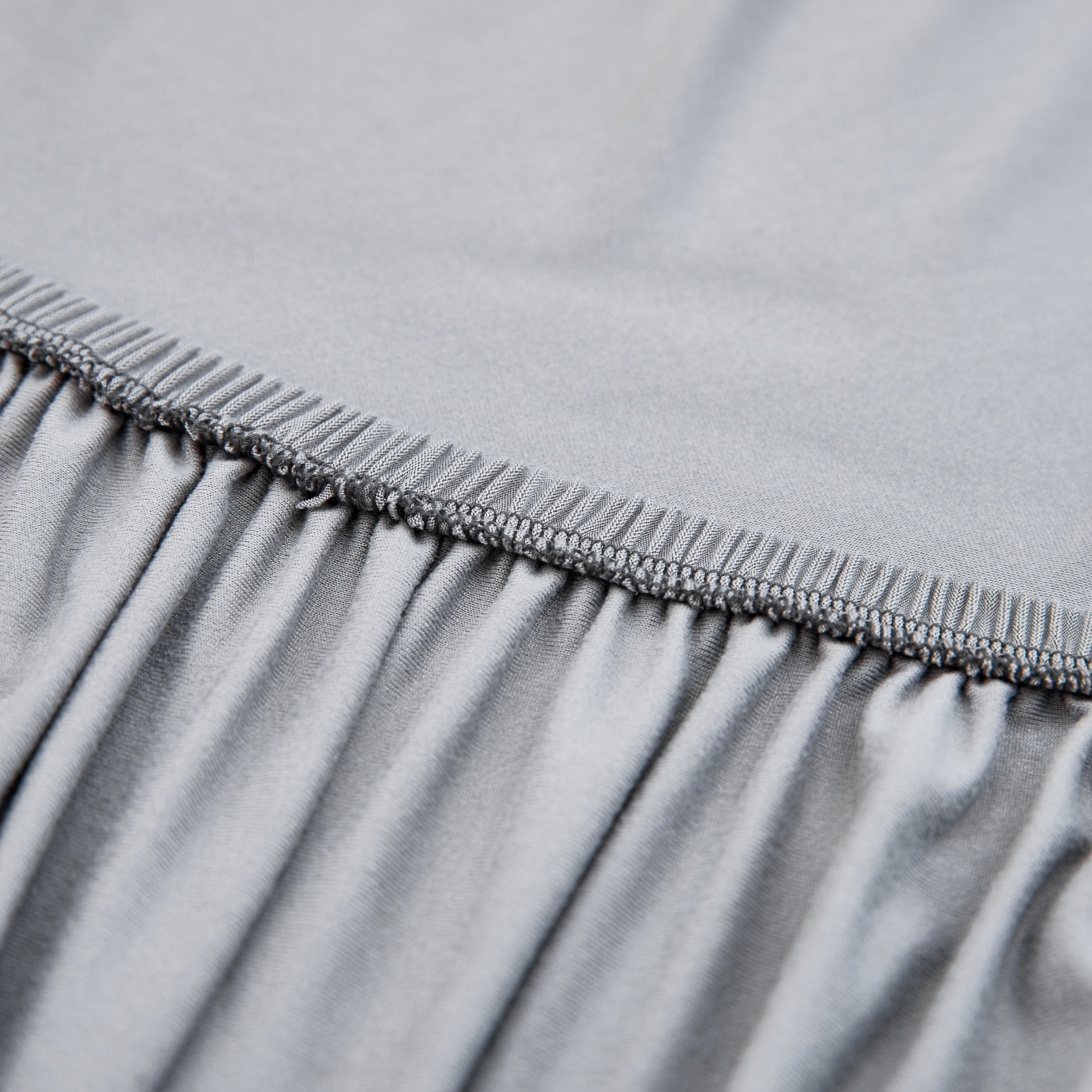 Housse de canapé élastique gris en microfibre en microfibre